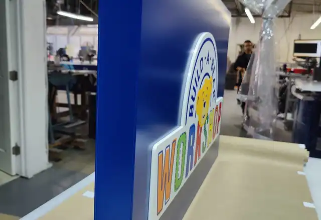 Dimensional sign panel showing depth and edge detail in the DVS Signage shop