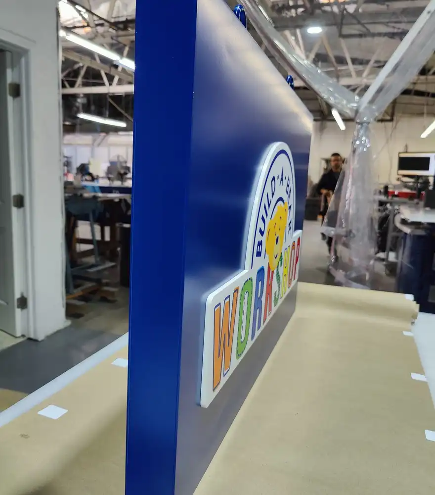 Dimensional sign panel showing depth and edge detail in the DVS Signage shop