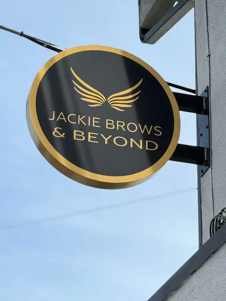 Jackie Brows & Beyond round blade sign