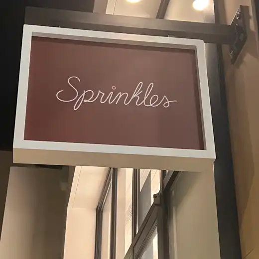 Sprinkles cursive blade sign