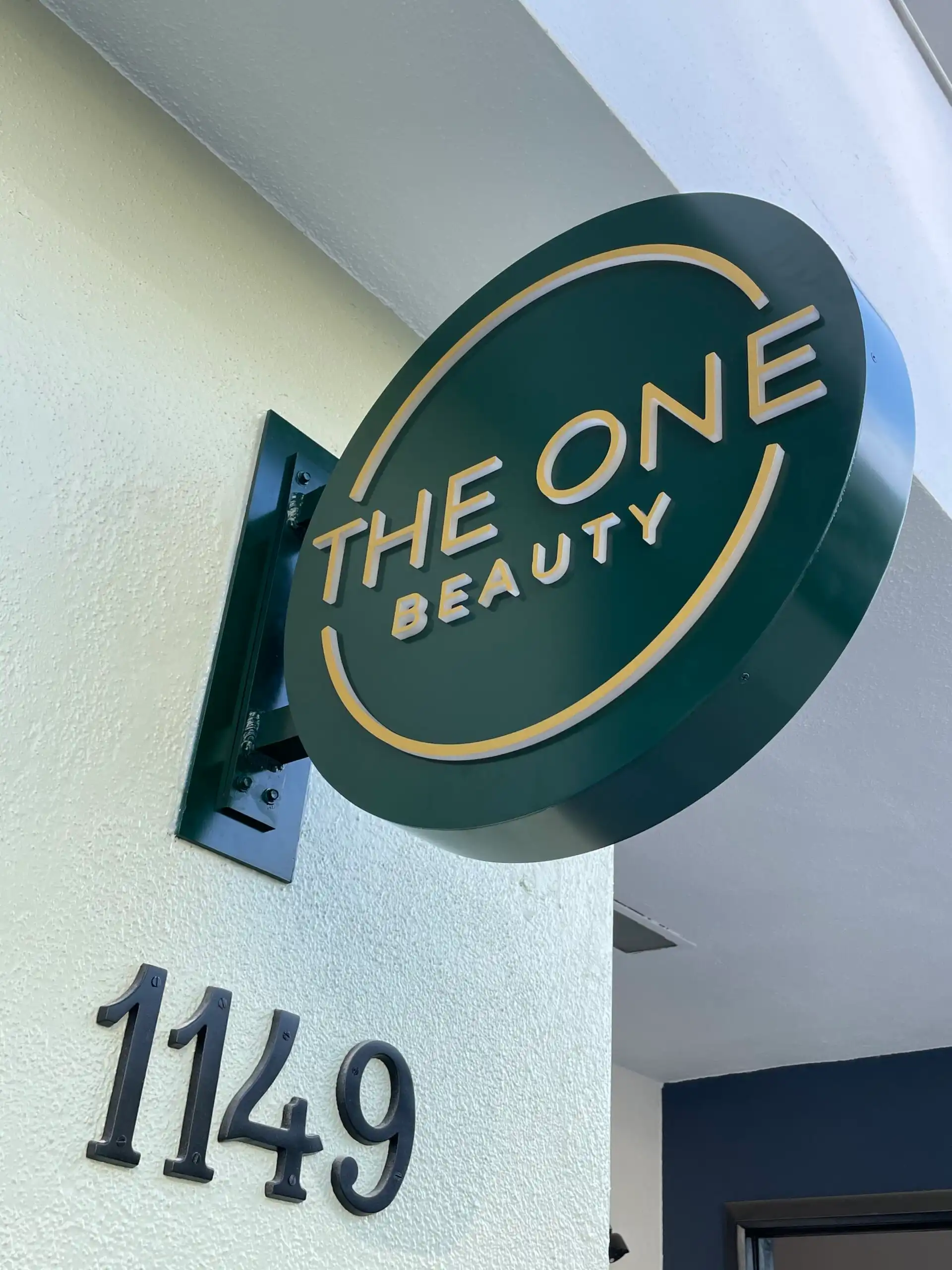 The One Beauty projecting blade sign
